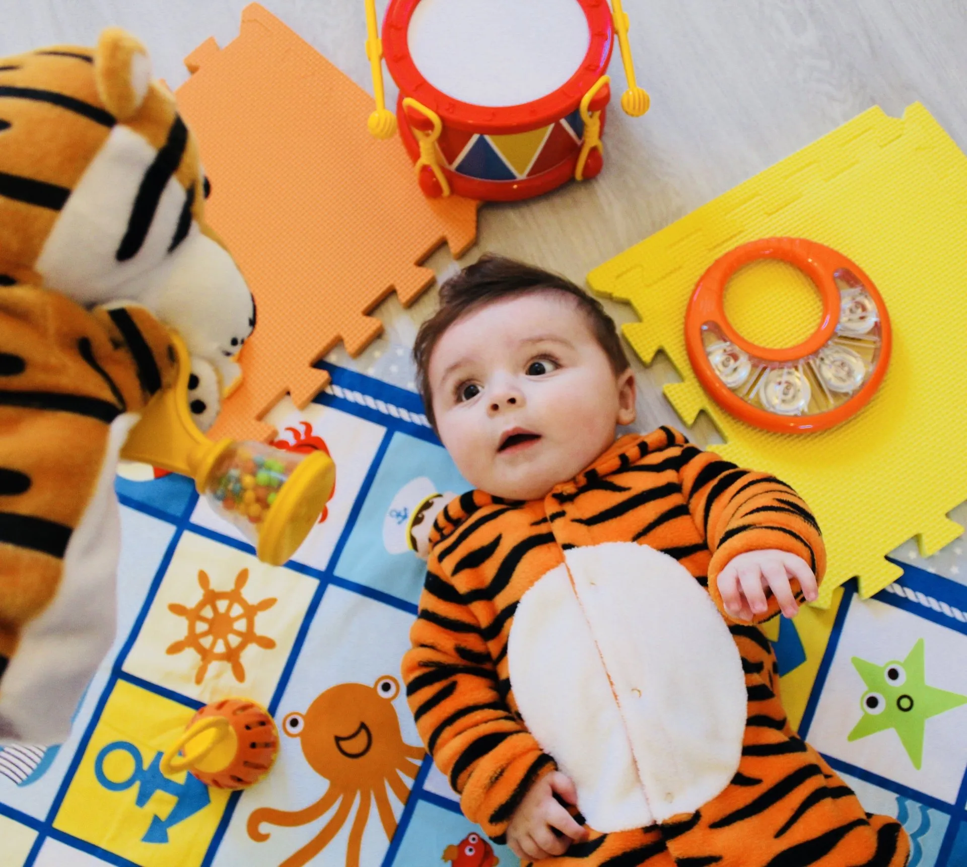 Baby dressed as a tiger for music event