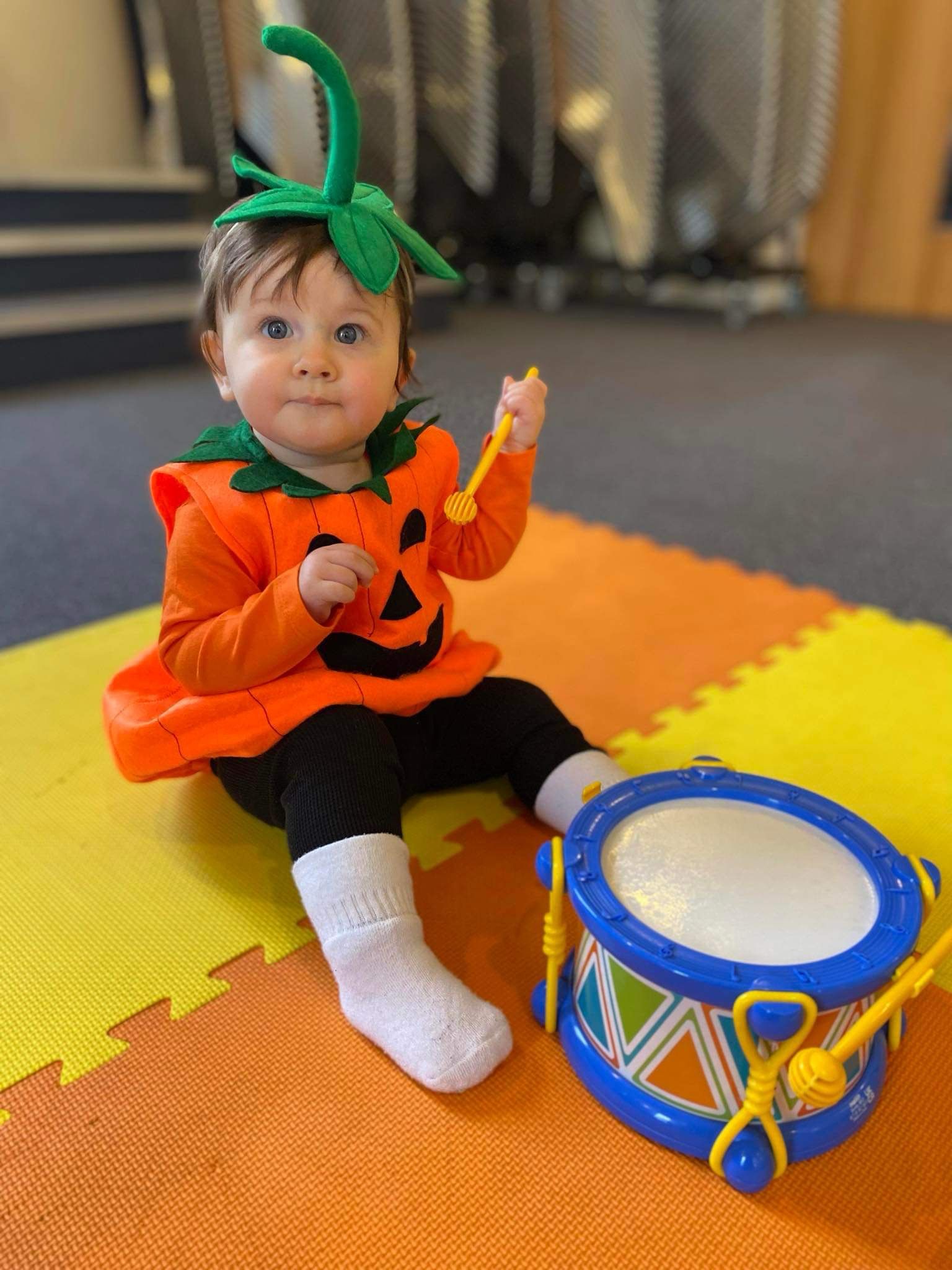 Seasonal event themed music class with child and drum